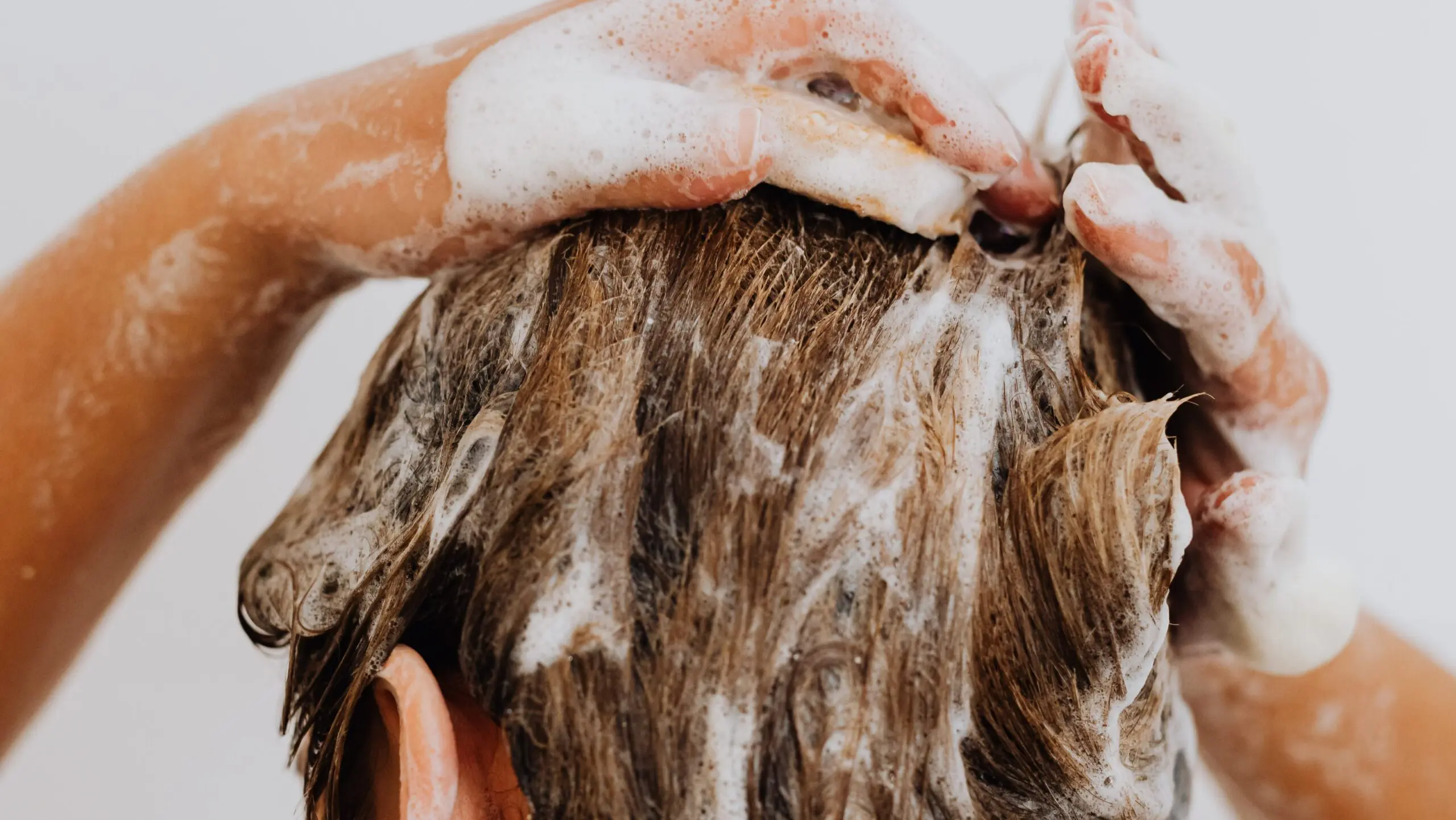 Woman Washing Hair edited scaled